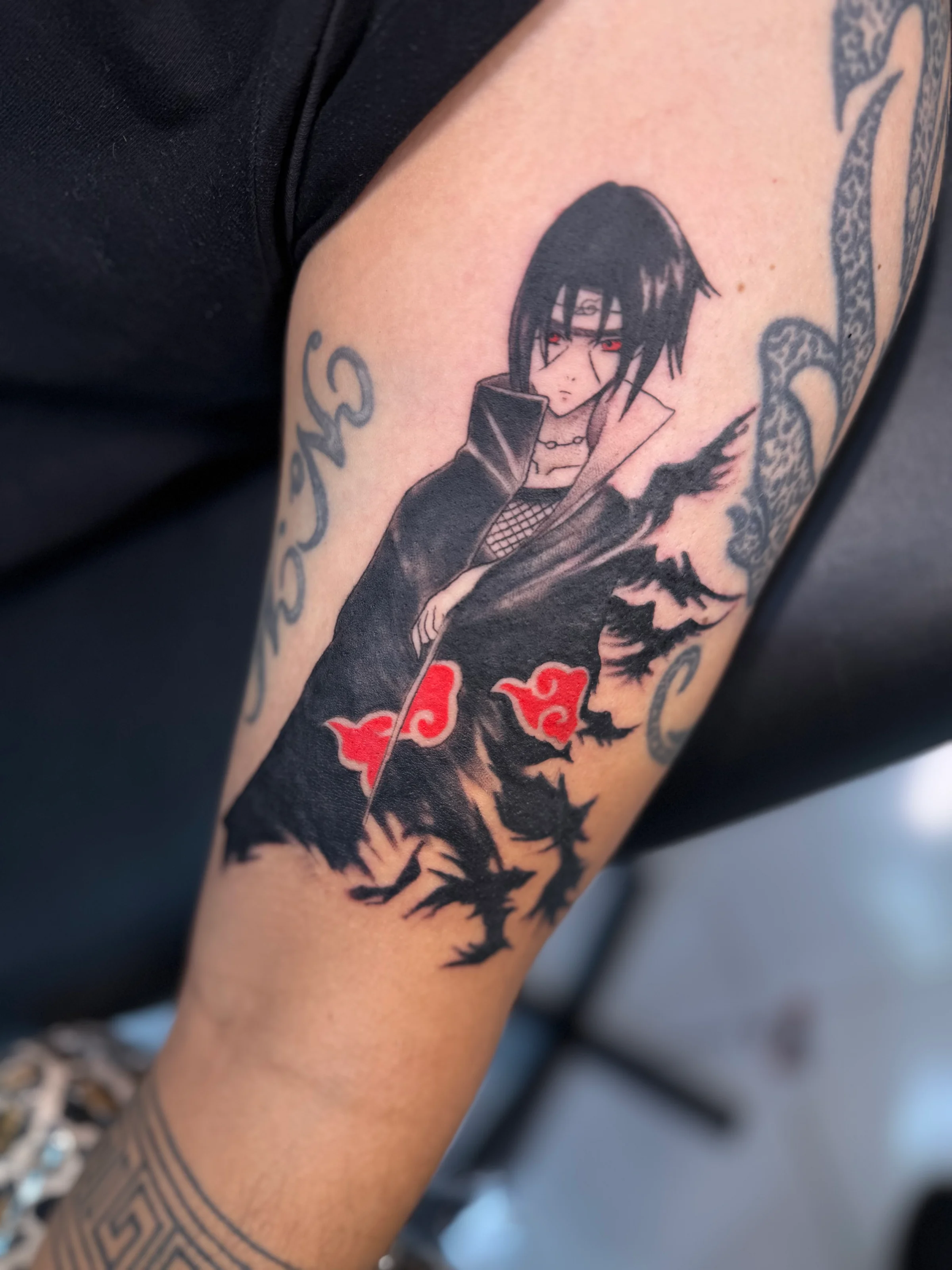 Sasuke black and white tattoo
